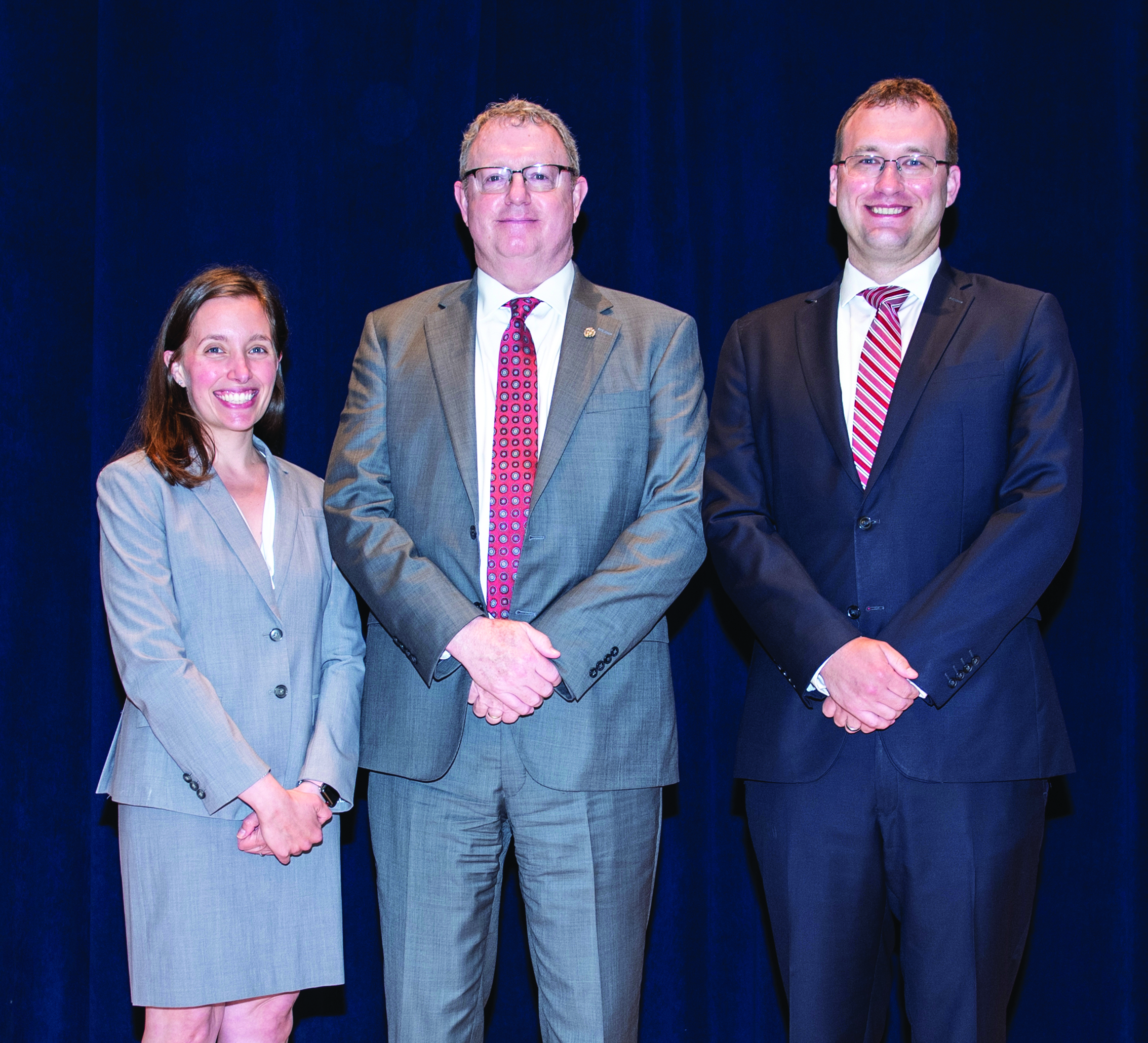 Mr. William Koon (center), Mr. Eric Hammerschmidt
        (right), and Ms. Jennifer Talley (left) celebrate Mr.
        Hammerschmidt and Ms. Talley’s graduation from
        the 69th Graduate Course at The Judge Advocate
        General’s Legal Center and School in Charlottesville,
        Virginia. Ms. Talley and Mr. Hammerschmidt are DA
        Civilians who were selected to attend the graduate
        course. (Credit: Jason Wilkerson, TJAGLCS)